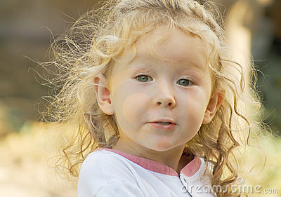     Beautiful Little Girl With Kinky Hair  Shallow Dof Portrait Style