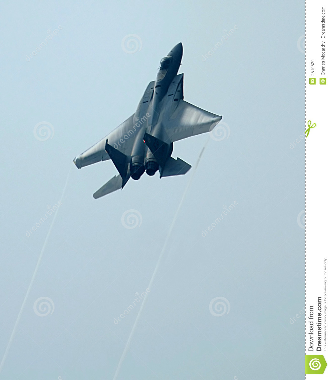 An F 15 Fighter Jet In A Vertical Climb Against A Cloudless Pale Blue