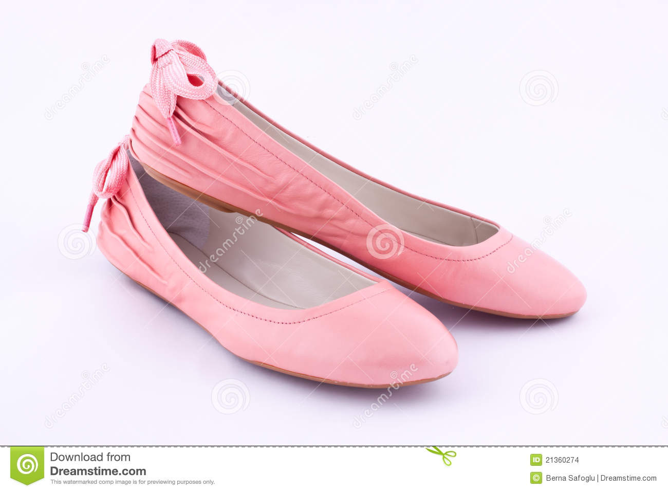 Pair Of Flat Shoes For Womenon A White Background 