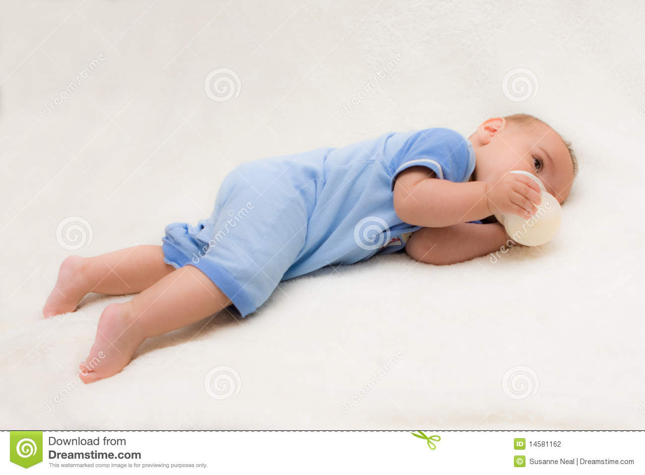 Baby Boy On Tummy Drinking Bottle Stock Photography   Image  14581162