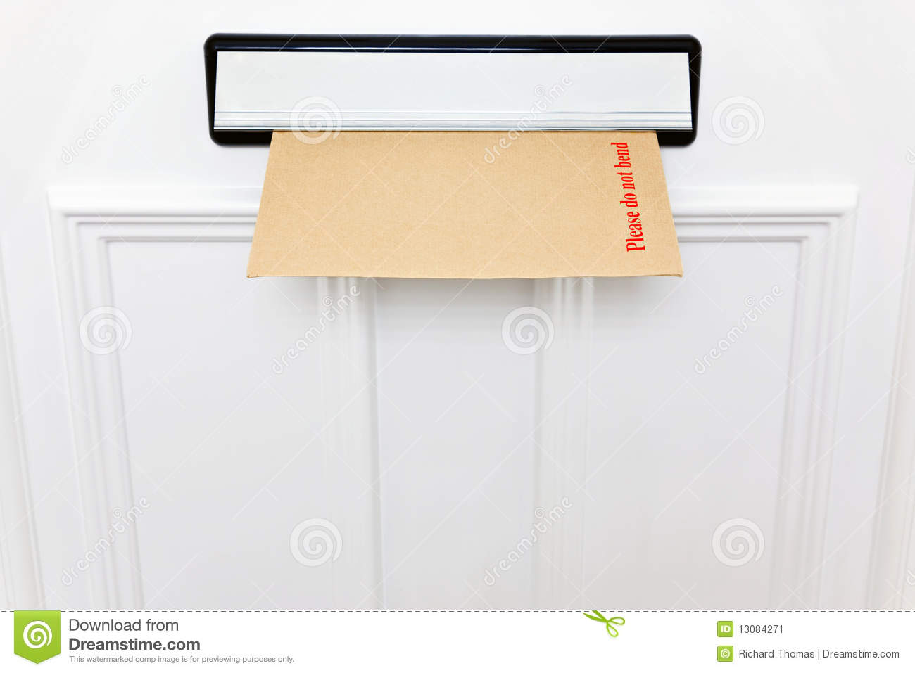 Please Do Not Bend Envelope In A Letterbox Of A White Front Door