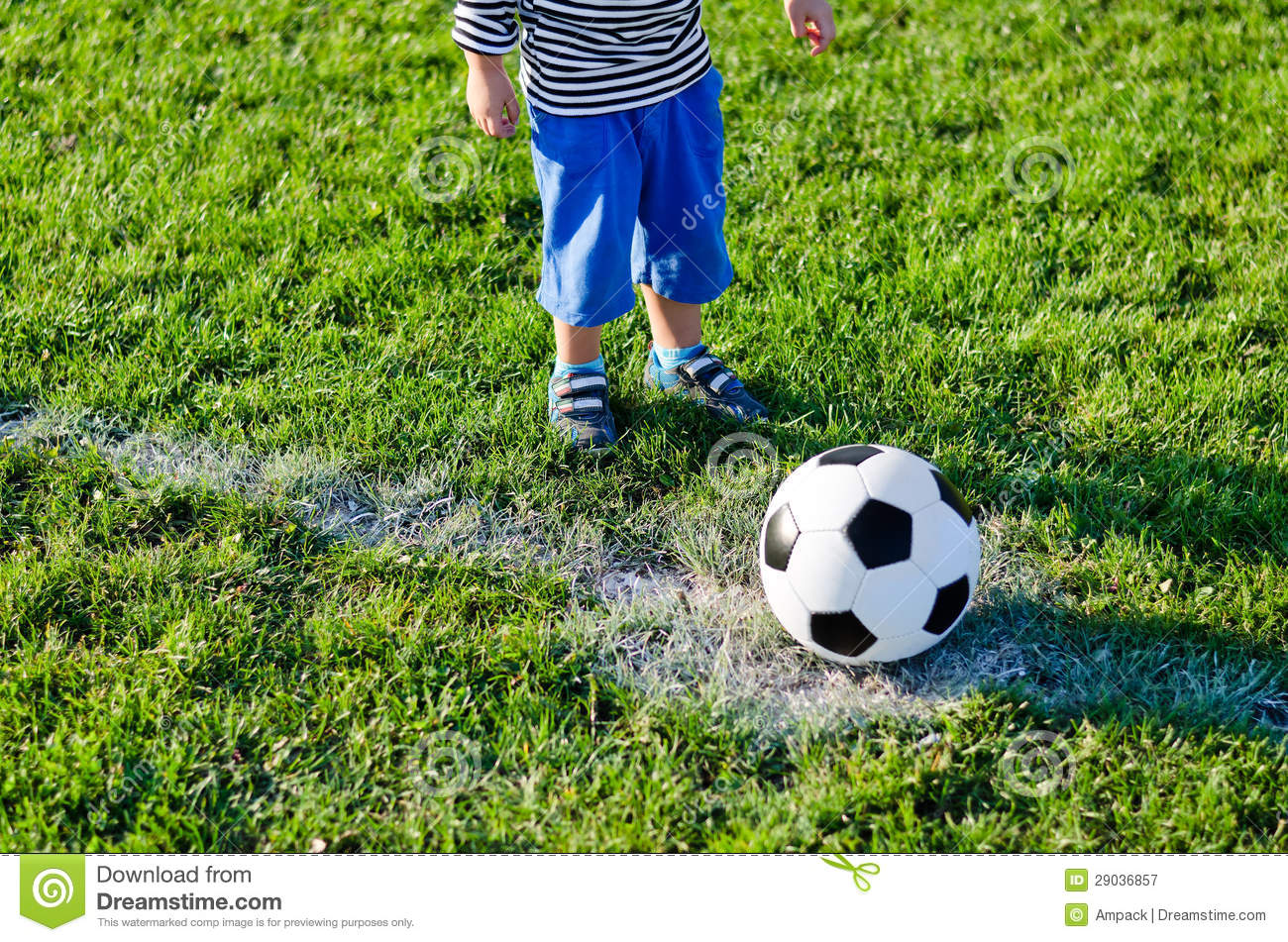 Little Child About To Kick Off Royalty Free Stock Photography   Image