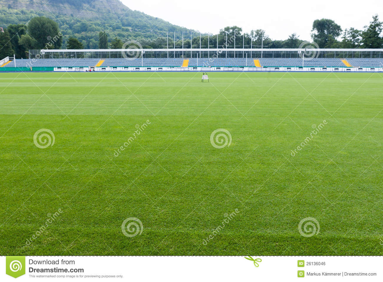 With A Manicured Green Grass Pitch And Sportsfield In Front Of It