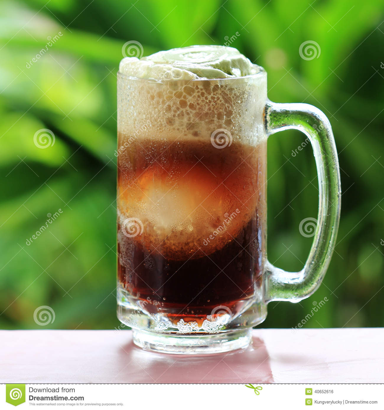 Root Beer Float A Tasty Summer Treat On Green Tree Background 