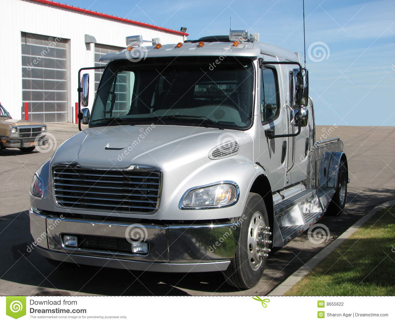 Nice Shot Of A Gray Crew Cab 4 Door Big Truck With Dual Wheels And
