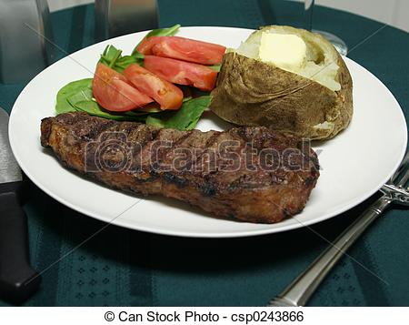 Stock Photo   Grilled Steak Dinner With Utensils   Stock Image Images    