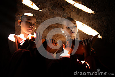 Two Southeast Asian Little Monks Reading Book Royalty Free Stock    