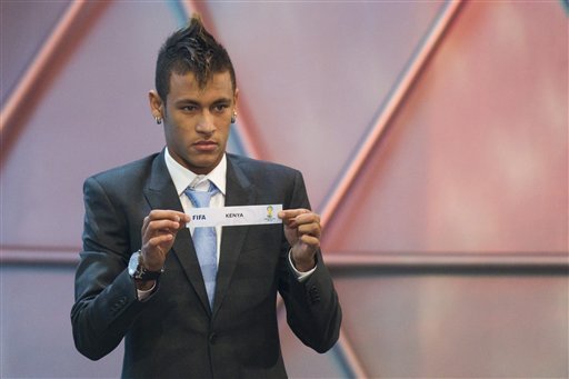 Brazil S Soccer Player Neymar Of Brazil Shows A Piece Of Paper With