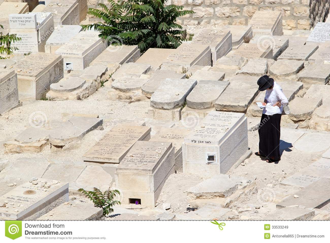 Jewish Orthodox Woman Is Praying In The Ancient Jewish Cemetery On The    