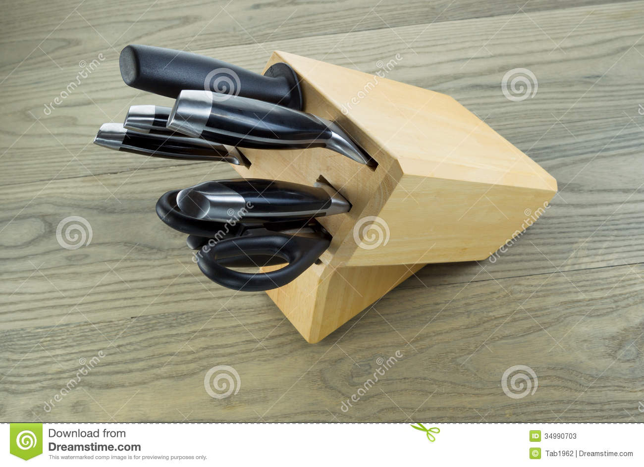 Photo Of Kitchen Knives Scissors And Sharpener In Wooden Holder On    