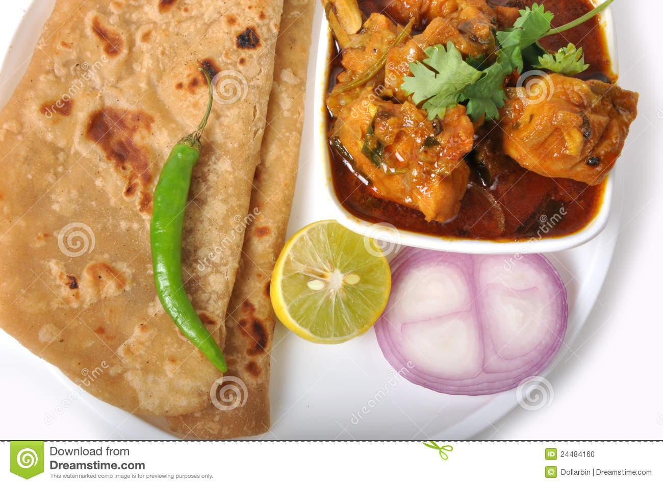 Closeup Shot Of Chapati With Chicken Onion Lemon And Green Pepper 