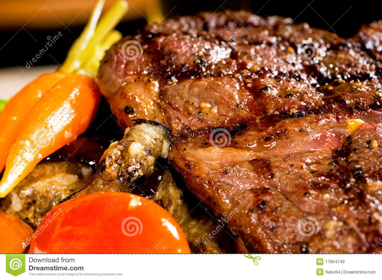 Fresh Grilled Ribeye Steak With Broccolicarrot And Cherry Tomatoes On