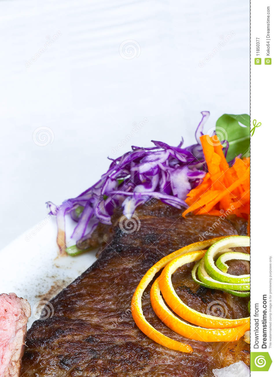 Fresh Juicy Beef Ribeye Steak Grilled With Orange And Lemon Peel On