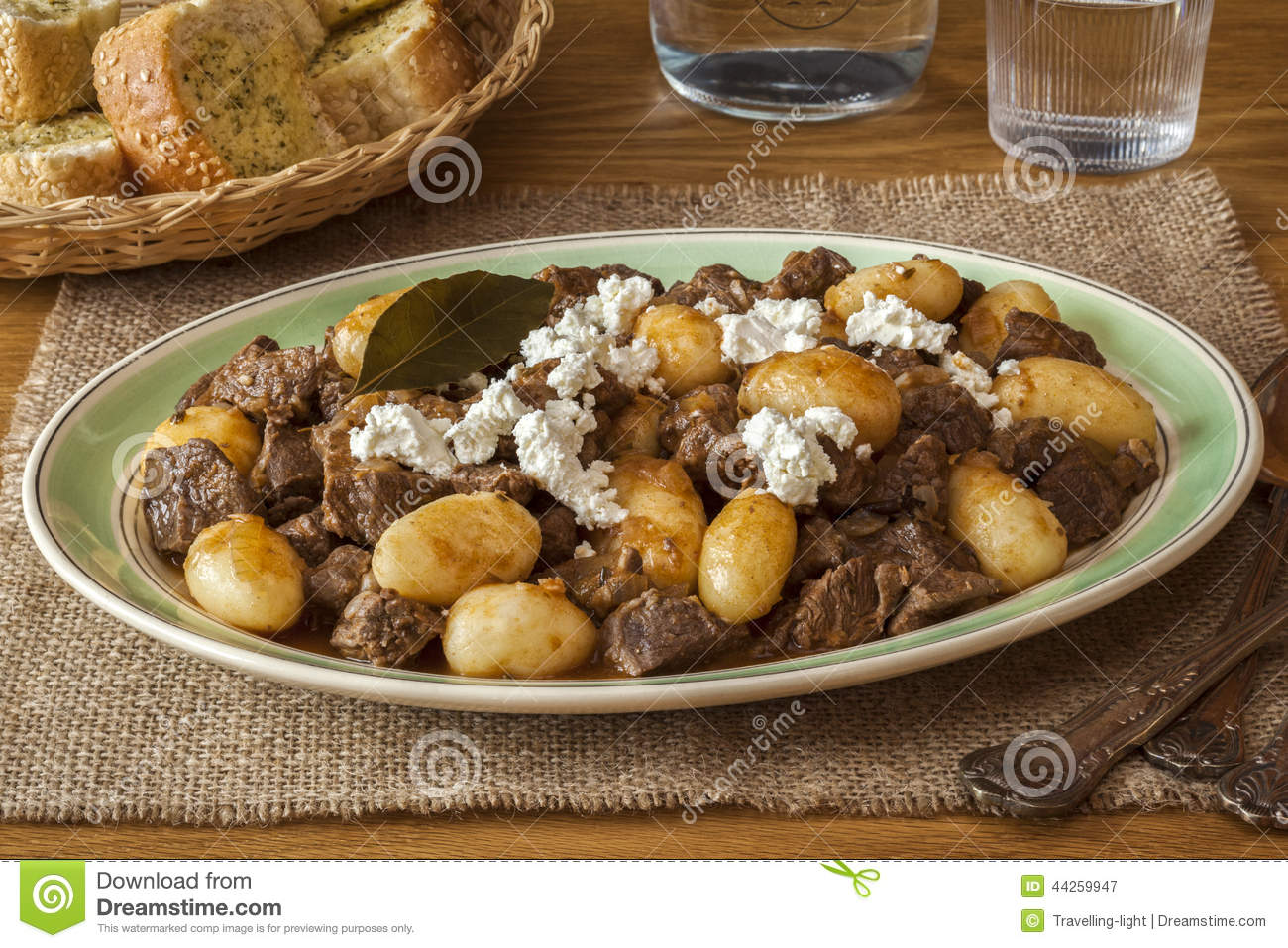 Greek Lamb Stew Or Stifado Topped With Crumbled Feta Cheese Served