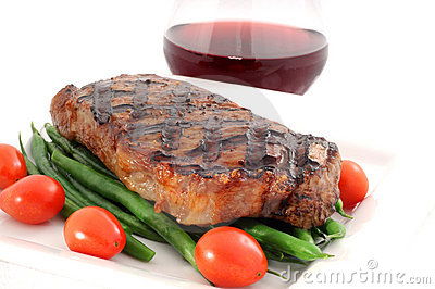 Ribeye Steak Grilled To Perfection With Green Beans