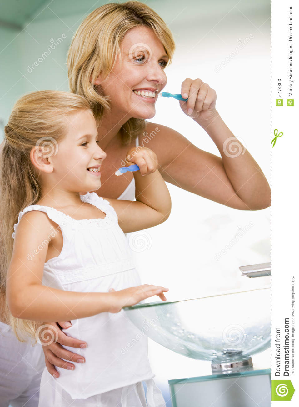 Young Girl In Bathroom Brushing Teeth Stock Photos   Image  5774803