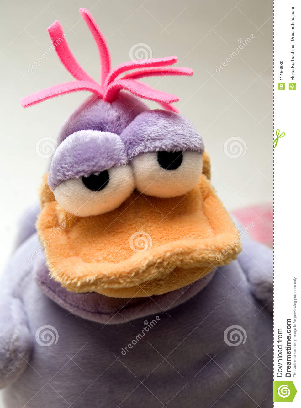 Sad Plush Violet Duck With Pink Hair Looking At You