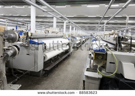 Textile Looms In A Spinning And Weaving Factory Production Hall In A