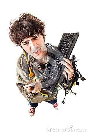 Casual Guy With Tangled Cables And A Keyboard Struggeling To Get