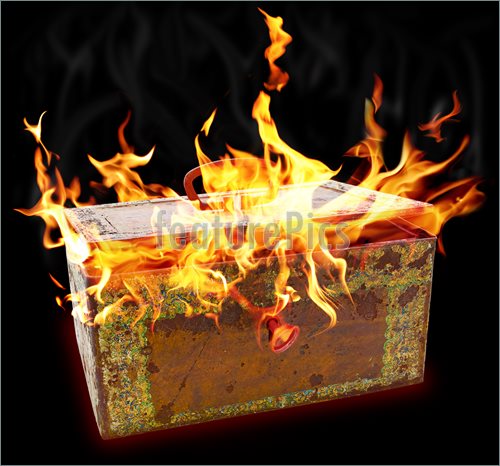 Image Of Old Rusty Metal Chest With Flame Tails Escaping Out Of Cover    