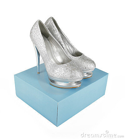 Silver Glitter Shoes On Turquoise Box Royalty Free Stock Images    