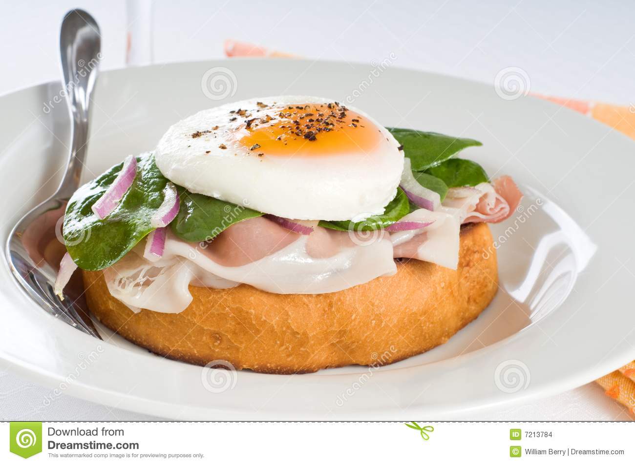 Elegant Breakfast Sandwich Of Poached Egg And Prosciutto 