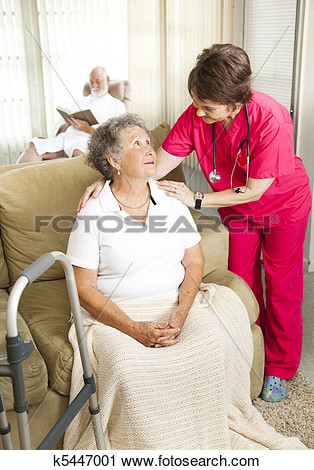 Nurse Cares For An Elderly Woman In A Nursing Home