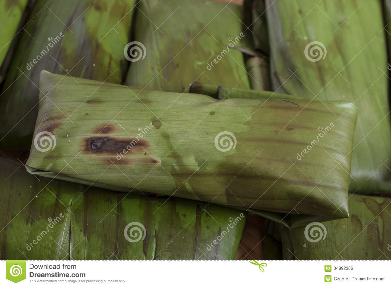     Of Pile Of Tamales Freshly Wrapped In Banana Leaves Prior To Cooking