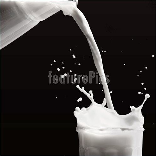 Image Of Pouring Milk    Pouring Milk From The Bottle To The Glass