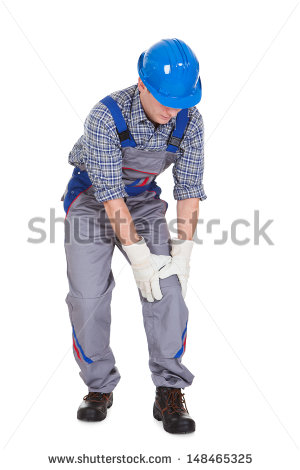 Male Worker Suffering From Knee Pain Isolated Over White Background    