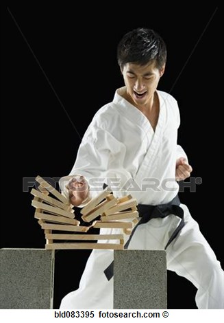 Asian Male Karate Black Belt Breaking Wooden Planks View Large Photo    