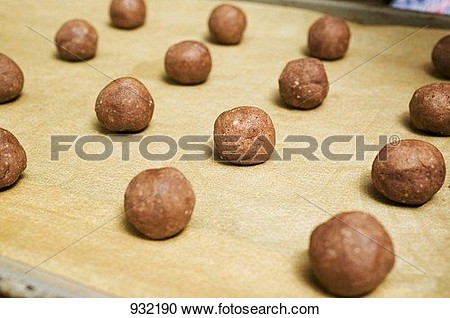 Stock Photography Of Small Balls Of Hazelnut Dough On A Baking Tray