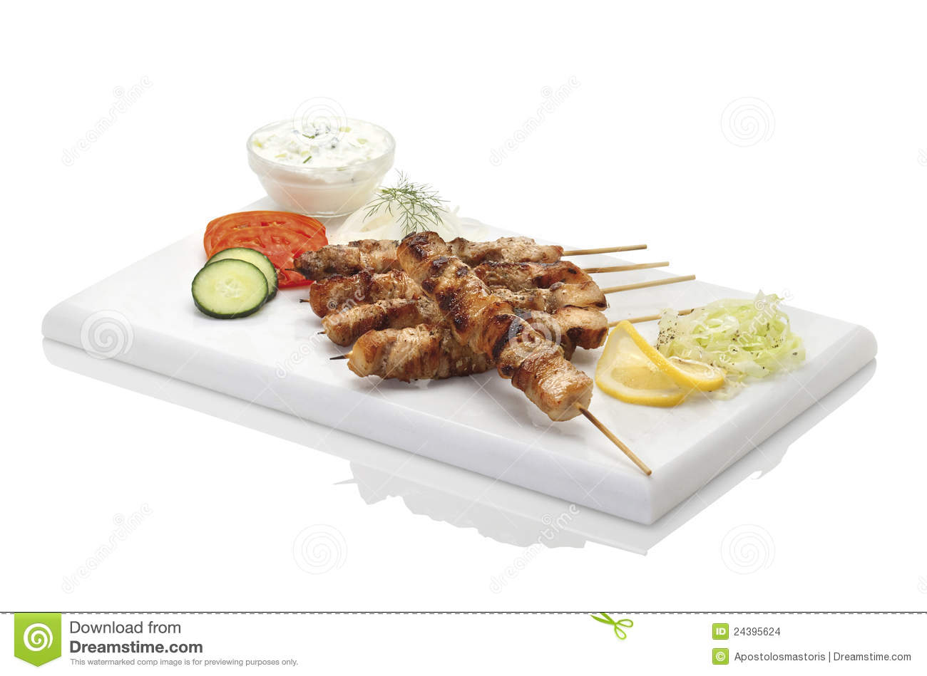 Typical Greek Plate Souvlaki Served With Tzatziki And Vegetables On    