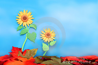 Cartoon Sunflower And Butterfly With Fall Leaves And Blue Sky