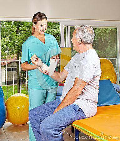Physiotherapist Helping Senior Man Stock Photography   Image  29021042
