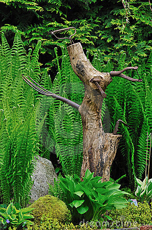 Tree Trunk Dog Sculpture In The Shade Garden Stock Photos   Image    