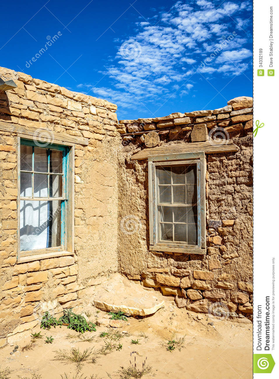 Adobe Mud And Brick Houses Sit High Atop A Mesa On The Indian