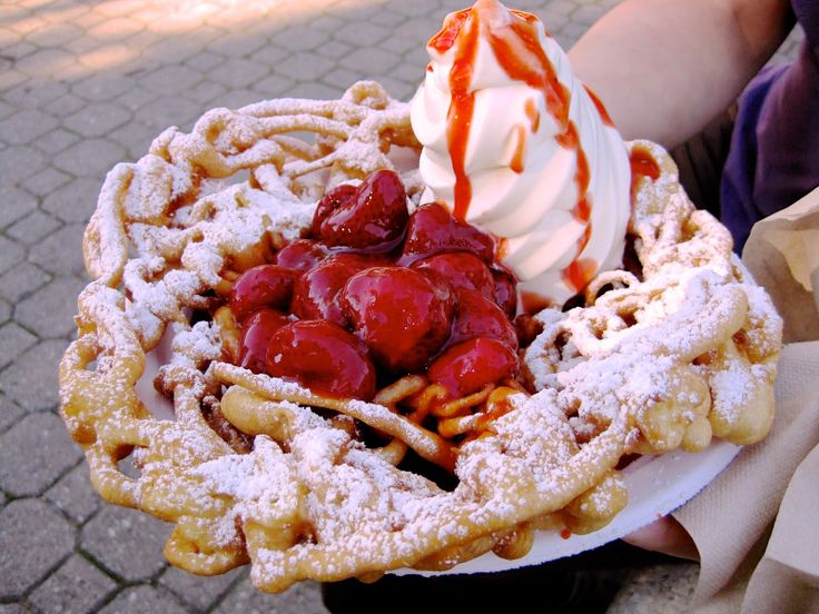 Carnival Food Funnel Cake With Whipped Cream And Strawberries