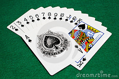 The Suit Of Spades Photgraphed On A Poker Mat 