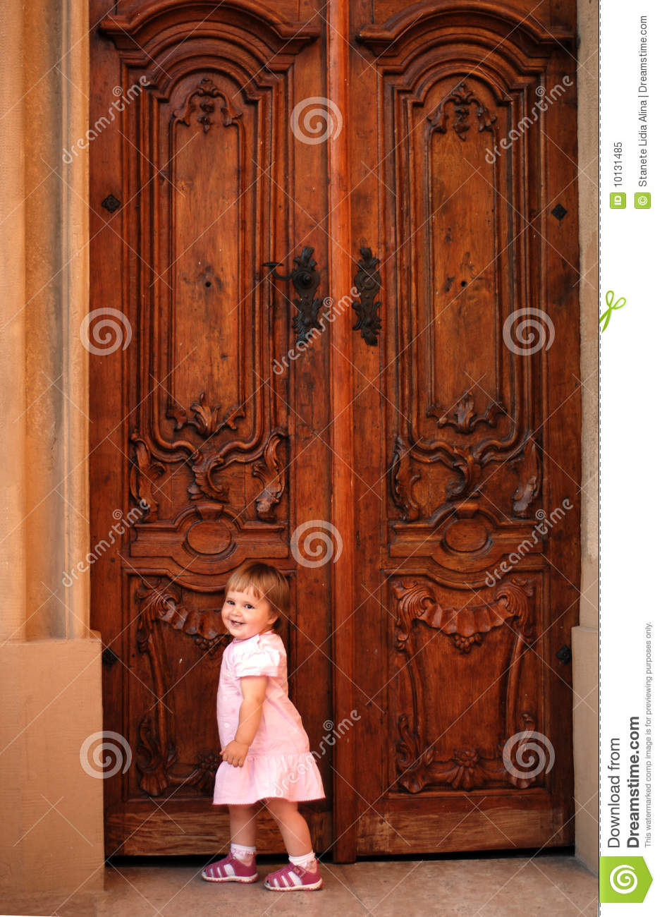 Little Girl Knocking At The Door Royalty Free Stock Photo   Image    
