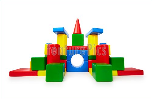Picture Of Pile Of Colored Toy Bricks Like A Castle On White
