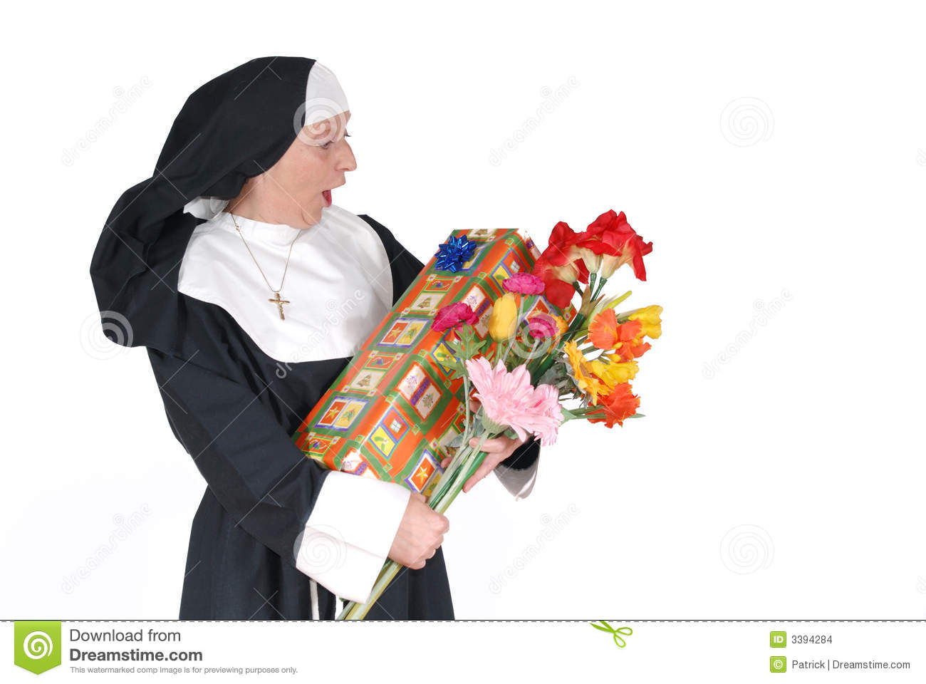 Middle Aged Sister Nun With Birthday Present And Flowers Happy