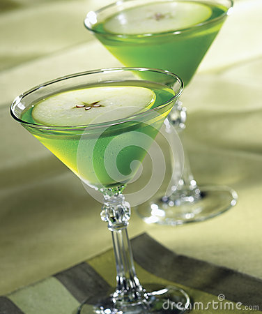 Apple Martini In Glasses On Green Background