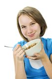 Girl Eating Cereal Royalty Free Stock Photography