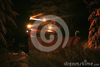 Night Snow Plow During Maintenance Road In Winter  Country Road On