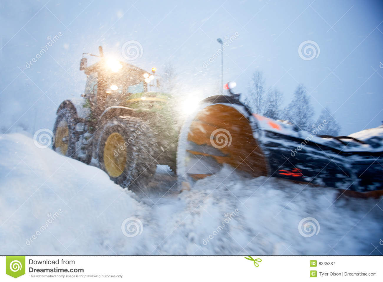 Snow Plow Clearing A Road In Winter