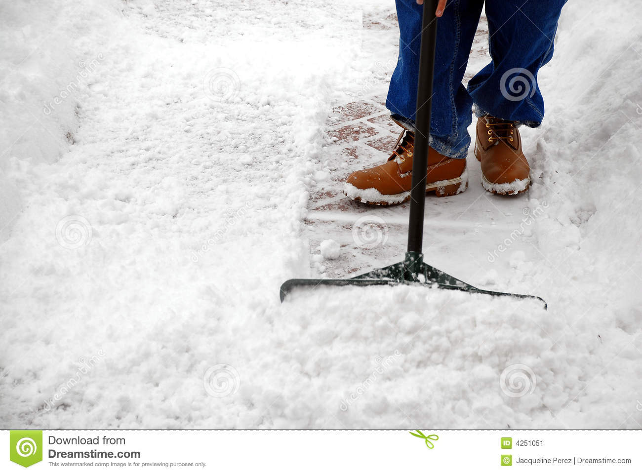Man Cleaning Snow From A Walkway With Copy Space