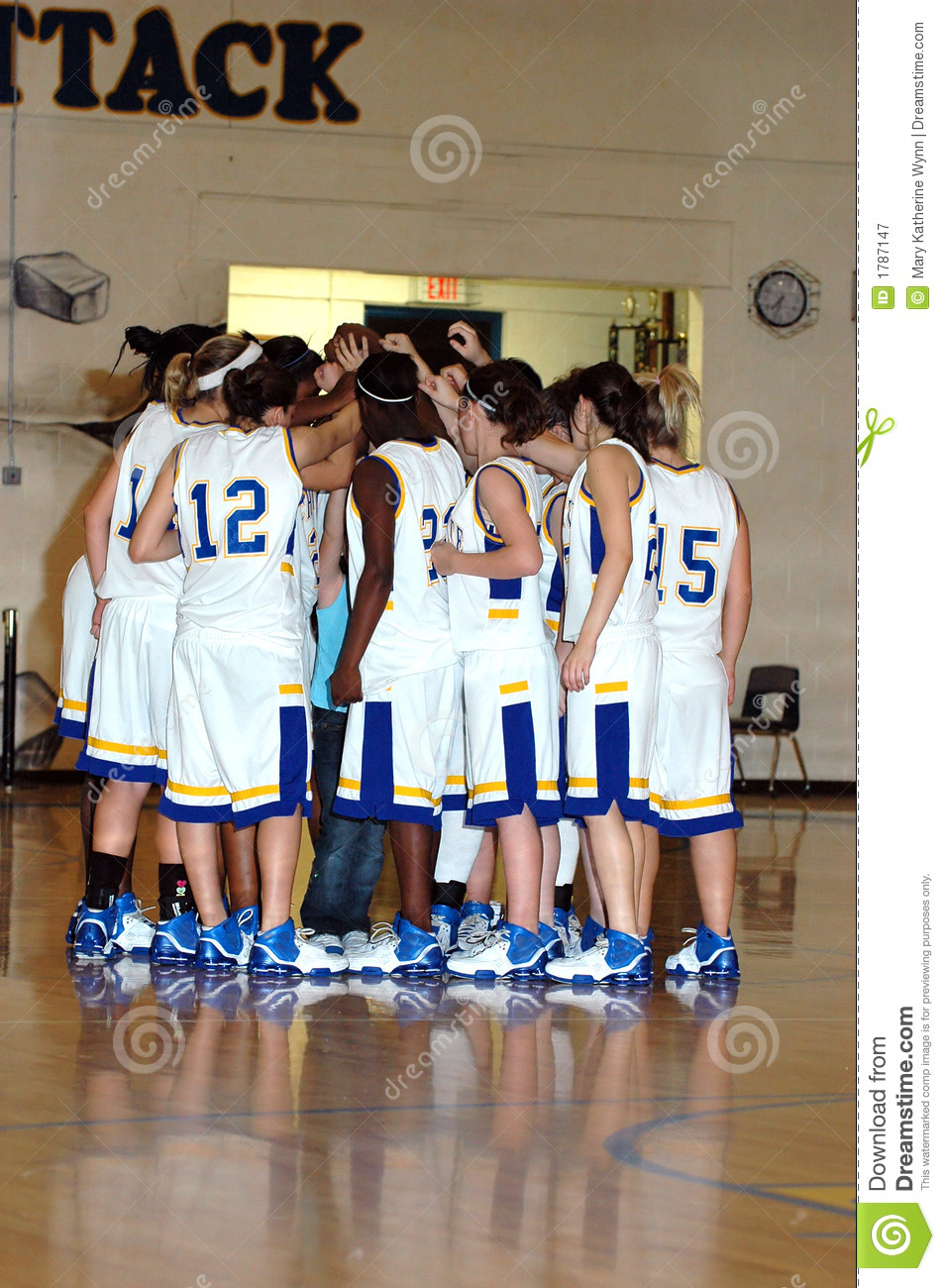 Huddle Of High School Girls Basketball Team 