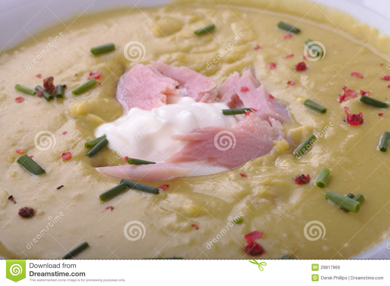 Pea And Ham Soup Close Up With Cream And Ham Pieces