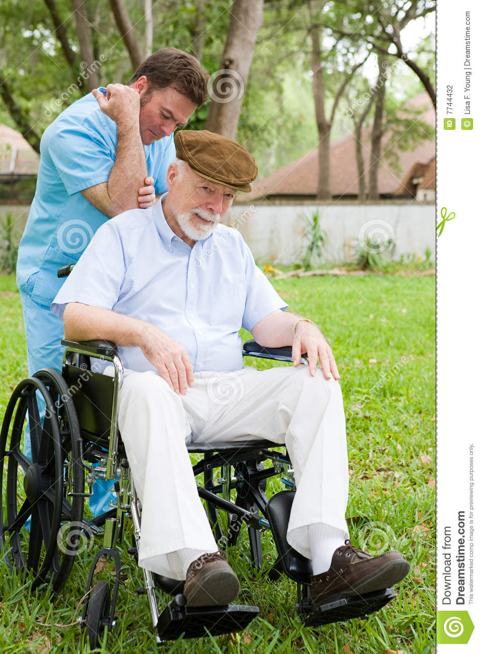 Disabled Senior Man Receiving Massage Therapy In A Lovely Outdoor